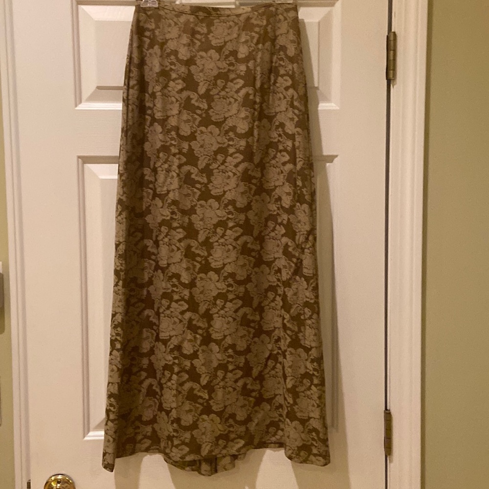 Brand new with tags Laura Ashley long skirt. Size 4. Rayon and acetate.